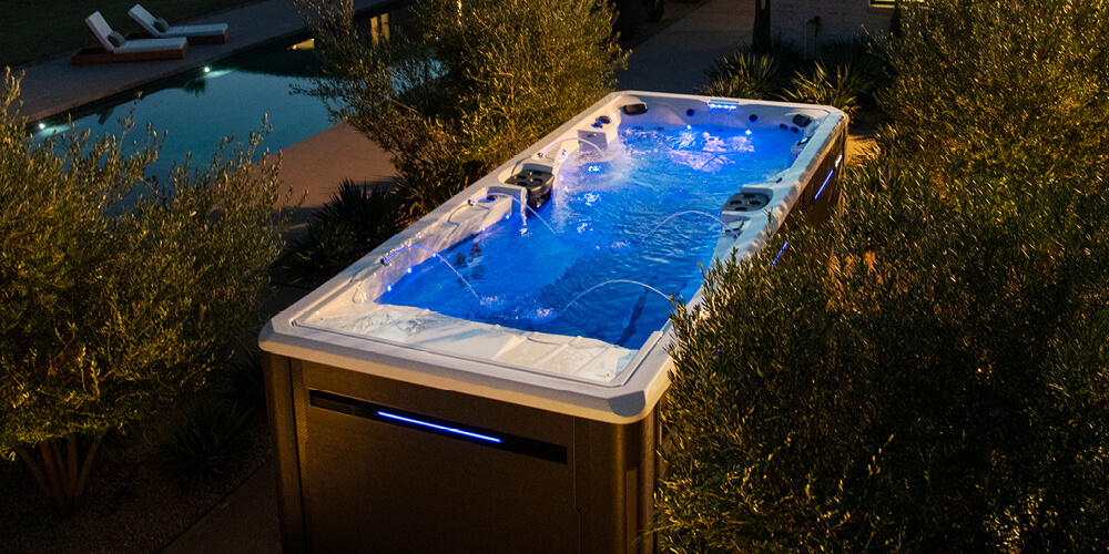 Michael Phelps Signature Pro swim spa with LED lights and water feature