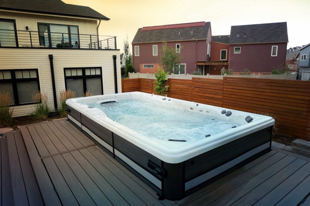 H2X Challenger 15D swim spa, in a backyard setting
