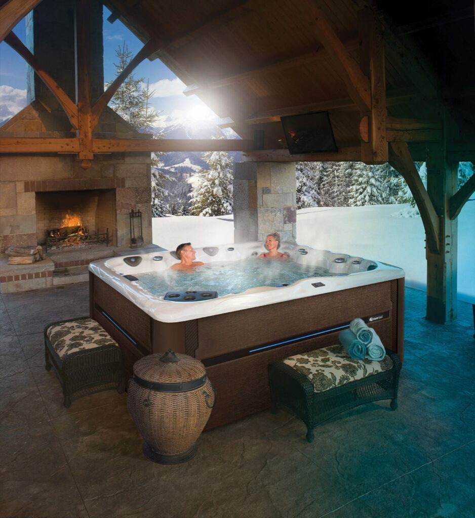 Michael Phelps Legend Series LSX 900 hot tub, older couple in the snow