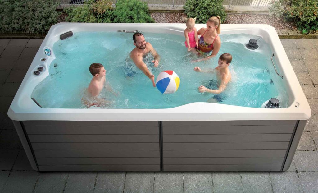 H2X Therapool 13 swim spa, in a backyard setting