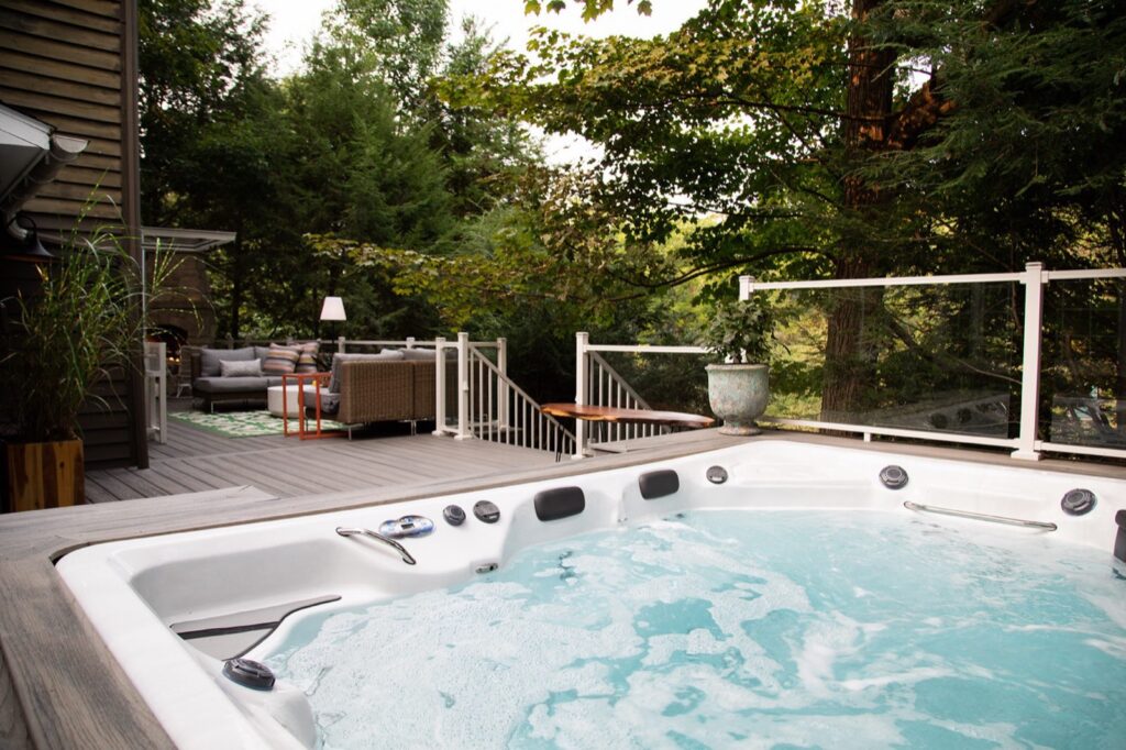 H2X Therapool D swim spa, in a backyard setting