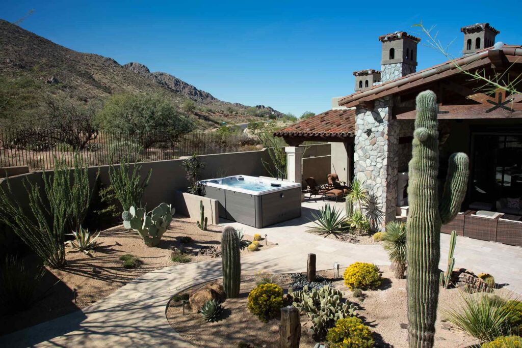 H2X Trainer 12 swim spa, in a backyard setting