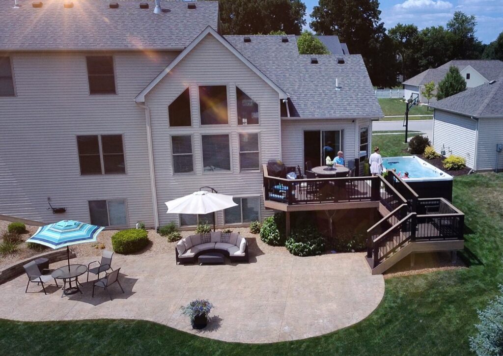 H2X Trainer 15D swim spa, in a backyard setting
