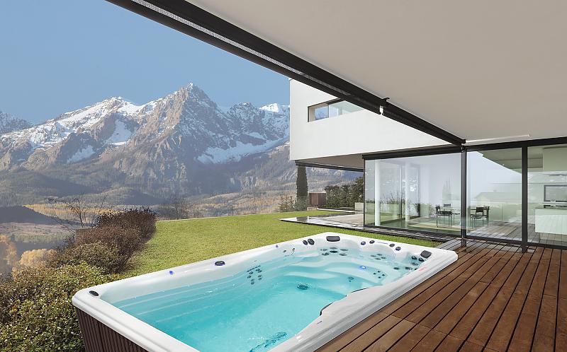 H2X Trainer 15D swim spa, backyard setting with mountain views