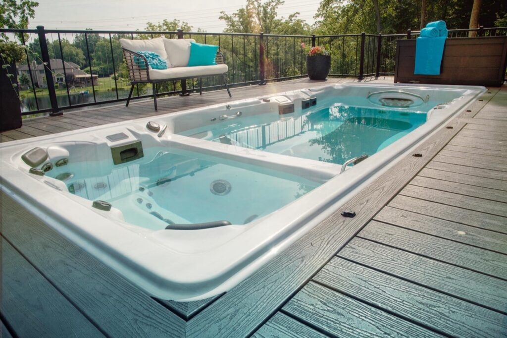 H2X Trainer 19D MAX swim spa, in a backyard setting