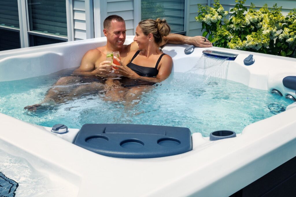 H2X Trainer 21 swim spa, couple relaxing