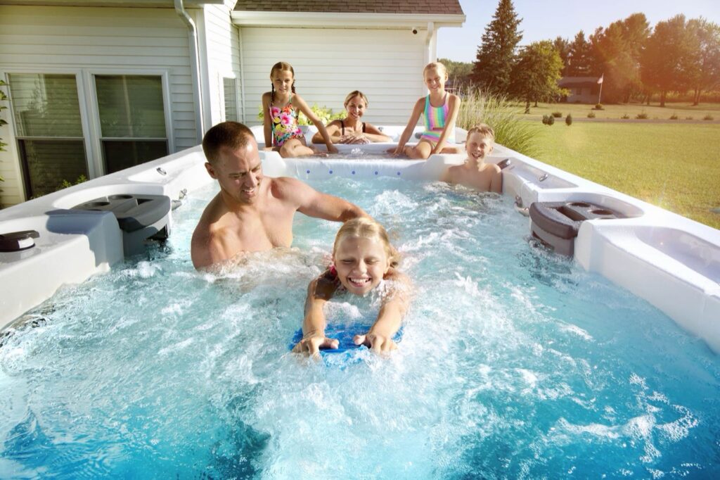 H2X Trainer 21 swim spa, in a backyard setting
