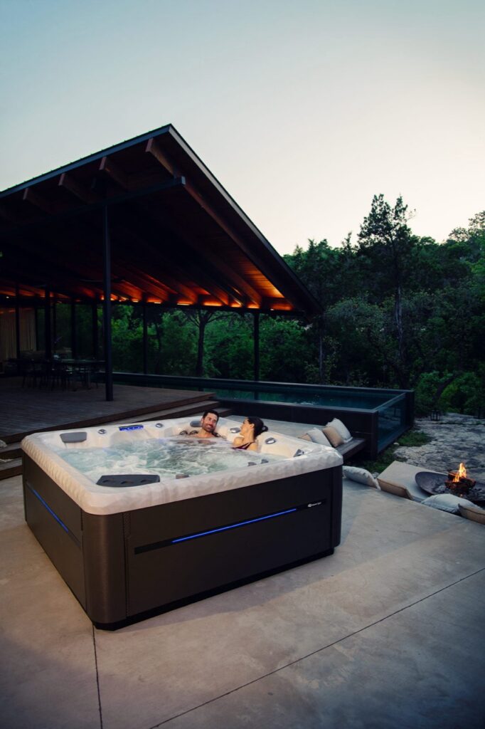 Twilight Series TS 8.2 hot tub, in a backyard setting